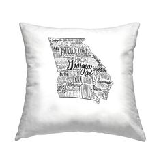 a white pillow with the state of michigan in black and white on it's side