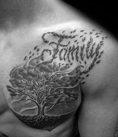 a man with a tree tattoo on his chest