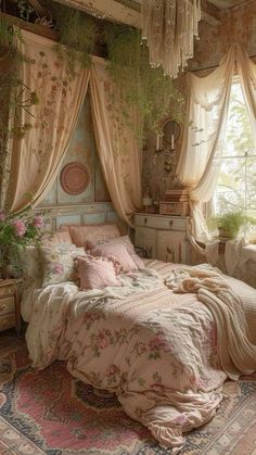 an old fashioned bedroom is decorated in pink and white colors with floral curtains, chandelier and bed linens