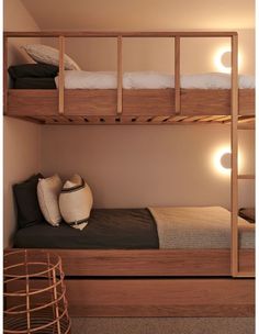 there is a bunk bed with two sets of stairs on the bottom and one set up above it