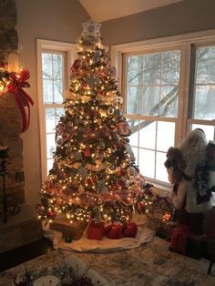 a decorated christmas tree in a living room