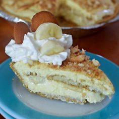 a piece of pie sitting on top of a blue plate