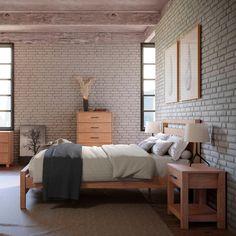 a bedroom with brick walls and wooden furniture