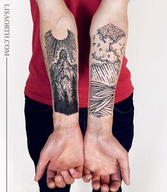 two hands holding each other with tattoos on their arms and the same person's arm