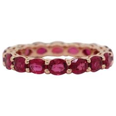 Oval shaped rubies in 18k rose gold eternity band. 16 total stones 3.79 carat total weight Ring size 6.5 Senior Rings, Ruby Eternity Ring, Rose Gold Eternity Band, Ruby Eternity Band, Ruby Band Ring, Vintage Anniversary Rings, Ruby Wedding Band, Gold Eternity Band, Faberge Jewelry