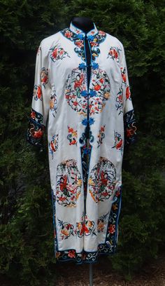 Vintage 60's Chinese hand embroidery silk robe color ivory, In good vintage condition. It's 100% silk. Weighs 12 Oz. Thanks. It's 43" long, sleeve to sleeve 49" long. Collar 14"3/4 long. Bust 42" long. Ship US only Silk Long Sleeve Kimono For Daywear, Beige Embroidered Long Sleeve Kimono, Long Cream Spring Kimono, White Long Sleeve Silk Kimono, Spring Silk Kimono With Embroidery, Spring Embroidered Silk Kimono, White Bohemian Silk Kimono, White Long Silk Kimono, White Silk Bohemian Kimono