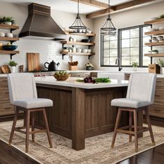 a kitchen island with two stools in front of it and open shelving on the wall