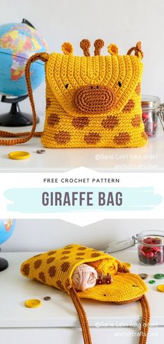 a crocheted giraffe bag sitting on top of a table next to a globe