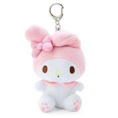 a hello kitty stuffed animal keychain with a bow on it's head