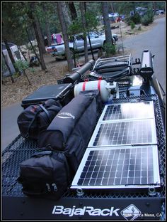 the back end of a truck with solar panels on it