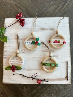 four wooden rings with christmas decorations on them