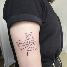 a woman with a tattoo on her arm has a fox and an umbrella in it