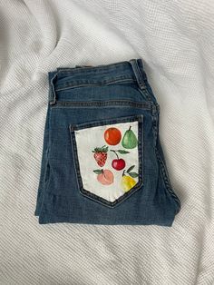 Lookin like a whole snack with these fruity jeans. Old Navy, size 2. Spring Cotton Bottoms With Strawberry Print, Cute Cotton Jeans With Pockets, Casual Cotton Bottoms With Strawberry Print, Fun Blue Cotton Jeans, Casual Hand Painted Cotton Bottoms, Cute Straight Leg Denim Bottoms, Hand Painted Denim Bottoms For Summer, Casual Hand Painted Bottoms For Summer, Hand Painted Cotton Bottoms For Summer