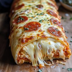 a slice of pepperoni pizza on a cutting board with parmesan cheese and herbs