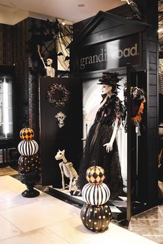 a display case with black and white decorations