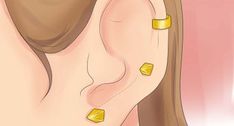 a woman's ear with gold studs on her ears and behind her ear is a pink wall