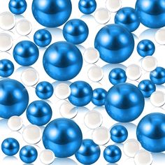 many blue and white balls floating in the air