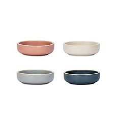 four bowls are shown in different colors and sizes