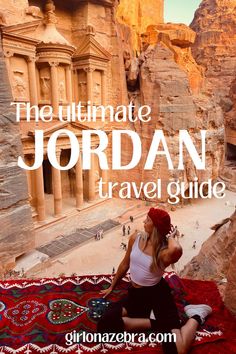 a woman sitting on top of a rug in front of a canyon with the words, the ultimate jordan travel guide