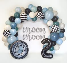 a balloon arch with balloons and the number twenty two in front of it that says moon upon