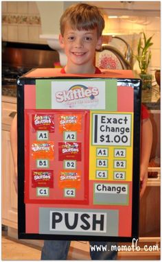 a young boy holding up a poster with words on it that say push and change