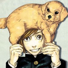 a person with a dog on their head and an animal on his shoulders over their head