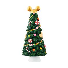 a green christmas tree with gold ears and candy canes on it's top