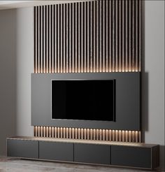 a modern living room with a large tv on the wall and wooden slats behind it