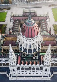 an aerial view of a large building with many spires and domes on it's sides