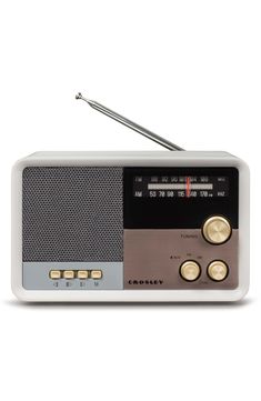 an old fashioned radio with two buttons and a needle in it's center, on a white background