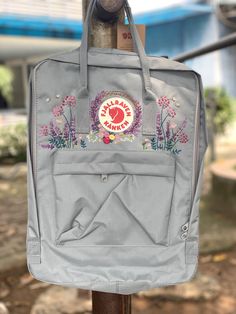 Welcome to our charming collection of hand-embroidered Fjallraven Kanken backpacks, meticulously crafted with love and precision. Elevate your style and stay organized on-the-go with these premium quality backpacks available in two convenient sizes:  - Medium (27x38x13cm)  - Large (32x42x13cm) + Key Features: - Hand-Embroidered Excellence: Each Fjallraven Kanken backpack is adorned with exquisite hand-embroidery, creating a unique and exclusive piece that sets you apart from the crowd. - Premium Kanken Embroidery, Embroidery Design Flowers, Mochila Fjallraven Kanken, Fjallraven Backpack, Kanken Classic, Backpack Fjallraven, Fjällräven Kånken, Embroidered Backpack, My Style Bags