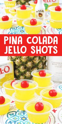 pine cola jello shots are arranged on a table with pineapples in the background