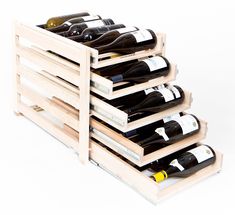 a wooden crate filled with lots of bottles of wine