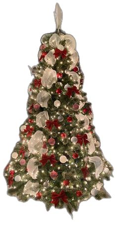 a decorated christmas tree with red and white ornaments on it's top, in front of a white background