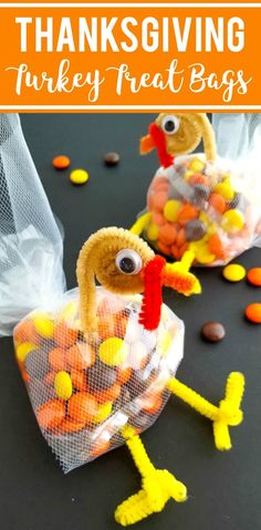 two turkey bags filled with candy and orange candies