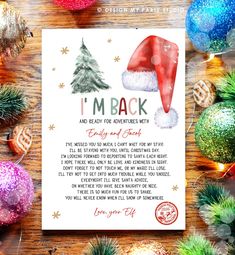 a christmas card with santa's hat on it and the words i'm back