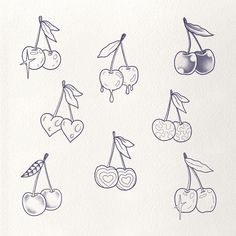 the cherries are drawn on paper and have been drawn with markers to make them look like