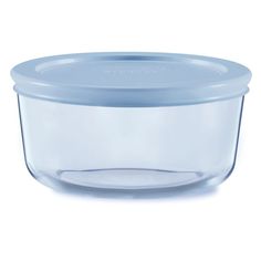 an empty glass bowl with a blue lid