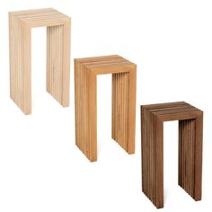 three wooden stools sitting next to each other