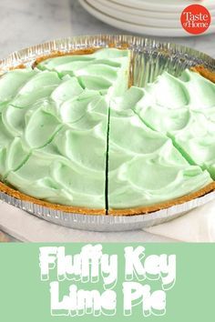 there is a pie with green frosting on it and the words fluffy key lime pie