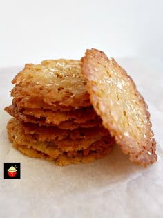 a stack of cookies sitting on top of a piece of paper