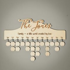 a wooden sign that says, the jones family - a little world created by love