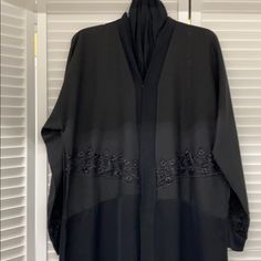 Full Length Dress. Lace Appliqu In Front And On Sleeves. Full Snap Opening In Front. Black Long Abaya For Spring, Long Black Abaya For Spring, Long Black Spring Abaya, Spring Black Long Abaya, Fitted Long Sleeve Black Abaya, Formal Fitted Black Abaya, Elegant Fitted Black Abaya, Lemonade Dress, Cream Maxi Dress