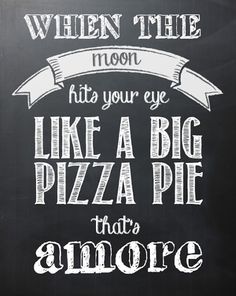 a chalkboard with the words when the moon hits your eye, like a big pizza pie that's amore