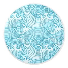 a blue and white plate with waves on it