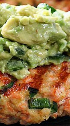 the meat is covered with guacamole and sauce