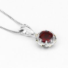 "Garnet Pendant, Natural Red Garnet Round and White Diamonds Pendant Necklace in Sterling Silver & 14K Yellow Gold, January Birthstone Flaunt Yourself With This Garnet And White Diamond halo Pendant. The Natural Gemstones Have A Combined Weight Of 2.32 Carats And Are Set In 14K Yellow Gold With .925 Sterling Silver. The Red Hue Of This Pendant Necklace Adds A Pop Of Color To Any Look! The Understated Design And Vibrant Stones Makes This Pendant Necklace Perfect For Every Occasion. Product De Red Lab-created Ruby Jewelry With Polished Finish, Red Polished Lab-created Ruby Jewelry, Red Lab-created Ruby Jewelry, Red Ruby Gemstone Necklace, Red Ruby Gemstone Necklaces, Red Round Garnet Jewelry, Red Garnet Round Jewelry, Red Gemstone-accented Jewelry For Formal Occasions, Red Gemstone Accented Jewelry For Formal Occasions