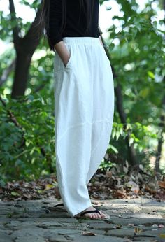 "★ Material: 100% Linen ★ Model Size: -- Model wear size M -- Model is 170 cm / 5'8\" -- Model measurements (bust 31\" / waist 26\" / hips 36\" ) ★ In order to make it more suitable for you. please tell me your body measurements : -- your Height -- your Weight -- your Bust -- Phone number for shipping Size S Flexible Waist: 70cm-85cm（27.5\"-33.5\"） Length: 85cm （33.5\"） Size M Flexible Waist: 75cm-90cm（29.5\"-35.5\"） Length: 86cm （33.8\"） Size L Flexible Waist: 80cm-95cm（31.5\"-37.5\"） Length: 8 Summer Lagenlook Harem Pants With Relaxed Fit, Casual Wide Leg Ankle-length Pants, Baggy Ankle-length Wide Leg Pants For Spring, Casual Baggy Ankle-length Wide Leg Pants, Spring Solid Baggy Harem Pants, Spring Baggy Solid Color Harem Pants, Spring Baggy Solid Harem Pants, Spring Solid Harem Pants, Summer Lagenlook Relaxed Fit Harem Pants