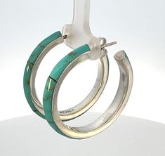 Featuring our Made in Mexico sterling silver 925 and turquoise open hoop earrings. Material/Metal: 925 sterling silver Makers Mark: Mexico 925 Stone: custom cut turquoise Size: 35mm diameter, 4mm wide Weight: 4.9Dwt pennyweight / 14 grams Style: boho, hippie, silver earring, Native American, Indian jewelry, Native Indian earring, Native American jewelry, hoop earring, turquoise earring, turquoise jewelry, stone jewelry, silver hoop earring Modern Turquoise Hoop Earrings, Nickel-free Turquoise Small Hoop Earrings, Small Nickel-free Turquoise Hoop Earrings, Turquoise Sterling Silver Nickel-free Hoop Earrings, Southwestern Turquoise Nickel-free Hoop Earrings, Open Hoop Earrings, Indian Earrings, Turquoise Earrings, Native American Jewelry