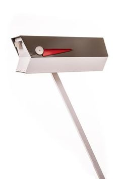 a red handled knife sticking out of a mailbox